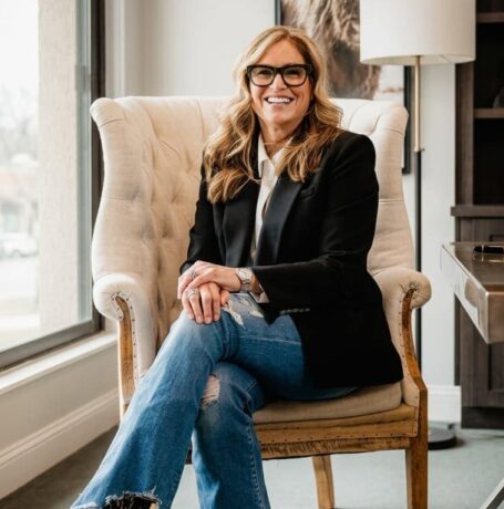 Susan Filan seated in an armchair